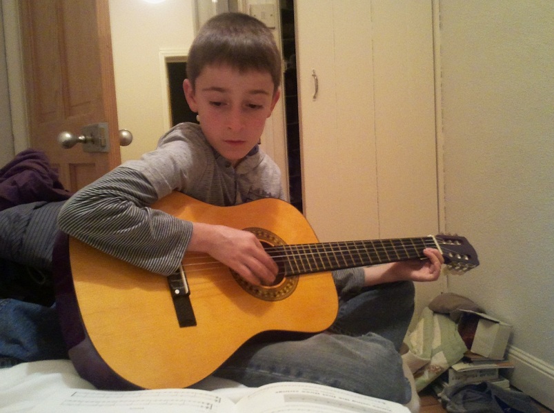 Xavi playing guitar, October 2011