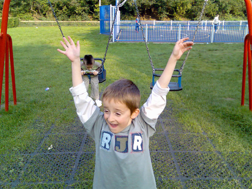 Xavier & Ander on swings at Town Garden Play Area - October 2006